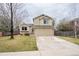 Charming two-story home featuring a well-maintained lawn and an attached two-car garage at 4820 W 125Th Ave, Broomfield, CO 80020