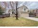 Charming two-story home featuring a two-car garage and well-manicured front lawn at 4820 W 125Th Ave, Broomfield, CO 80020
