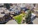 Aerial view of backyard with lush lawn, pond, patio and garden at 4045 E 18Th Ave, Denver, CO 80220