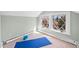 Bonus room with bright windows and a blue yoga mat at 4045 E 18Th Ave, Denver, CO 80220