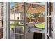 Outdoor patio with comfortable seating, a fire table, and a view of the landscaped backyard at 4045 E 18Th Ave, Denver, CO 80220