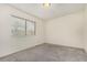 Bright bedroom with a window and neutral wall color at 9255 E Lehigh Ave # 211, Denver, CO 80237