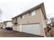 Attached garage with extra storage space at 9255 E Lehigh Ave # 211, Denver, CO 80237