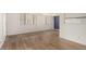 Bright and airy living room with hardwood floors and window at 9255 E Lehigh Ave # 211, Denver, CO 80237