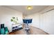 Bright bedroom area features workout equipment and accessories, neutral carpet, and closet at 8910 Rutgers St, Westminster, CO 80031