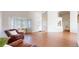 Spacious living room with large bay window, hardwood floors and a charming interior design at 8910 Rutgers St, Westminster, CO 80031