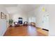 Inviting living room featuring vaulted ceilings, a fireplace, and a large bay window at 8910 Rutgers St, Westminster, CO 80031