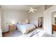 Spacious main bedroom with vaulted ceiling, ceiling fan, walk in closet, and ensuite at 8910 Rutgers St, Westminster, CO 80031