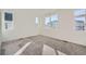 Spacious bedroom with gray carpet and large windows at 14586 W 91St Ave # A, Arvada, CO 80005