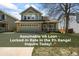 Charming two-story home with a stone facade, attached garage, and a cozy front porch at 2602 E 145Th Ave, Thornton, CO 80602