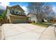 Two-story home with an attached two car garage and a well-maintained lawn at 2602 E 145Th Ave, Thornton, CO 80602