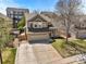 Two-story home with stone accents, well-maintained landscaping, and an attached two car garage at 2602 E 145Th Ave, Thornton, CO 80602