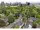 Aerial view of a community with lush green trees and well-maintained houses at 4505 S Yosemite St # 362, Denver, CO 80237