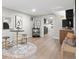 Finished basement area with bar, hardwood floors and bench seating at 4505 S Yosemite St # 362, Denver, CO 80237
