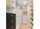 Walk-in closet with custom shelving and drawers, offering ample storage and organization solutions at 4505 S Yosemite St # 362, Denver, CO 80237