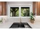Modern kitchen sink with a view to the backyard and outdoor space at 4505 S Yosemite St # 362, Denver, CO 80237
