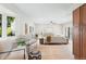 Bright living room features hardwood floors, neutral decor, and large windows at 4505 S Yosemite St # 362, Denver, CO 80237