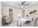 Office featuring a large window, soft grey chairs and a modern table at 4505 S Yosemite St # 362, Denver, CO 80237