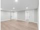 Spacious, empty room with wood floors and ample lighting, ready for any design ideas at 4505 S Yosemite St # 362, Denver, CO 80237