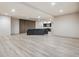 Spacious basement with hardwood floors and modern finishes, perfect for entertainment or relaxation at 14545 Lipan St, Westminster, CO 80023