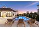 Beautiful pool with lounge chairs and landscaping, adjacent to home gym at 14545 Lipan St, Westminster, CO 80023
