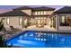 Luxurious pool area with lounge chairs and a beautifully designed outdoor space for relaxation at 14545 Lipan St, Westminster, CO 80023