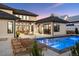 Inviting pool area with lounge chairs, a modern home exterior, and an outdoor living space at 14545 Lipan St, Westminster, CO 80023