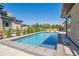 Sparkling in-ground pool and hot tub with lounge area at 14545 Lipan St, Westminster, CO 80023