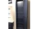 Custom blue cabinet with glass shelves at 5875 E Iliff Ave # 203, Denver, CO 80222