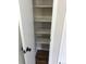 The organized closet features shelving for storage and organization at 5875 E Iliff Ave # 203, Denver, CO 80222