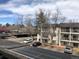 Condo with parking and trees surrounding at 5875 E Iliff Ave # 203, Denver, CO 80222