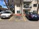 Well-kept parking lot with designated spots in front of the building for residents' convenience at 5875 E Iliff Ave # 203, Denver, CO 80222