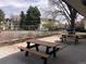 Outdoor picnic tables and barbecue grill make the building a fun place for residents to gather and relax at 5875 E Iliff Ave # 203, Denver, CO 80222