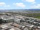 Expansive view of city apartments, railway, highways, and neighborhood, showcasing urban development and connectivity at 1898 S Bannock St # 209, Denver, CO 80223