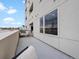 Spacious balcony offering a private outdoor space with sunny views and room for lounging at 1898 S Bannock St # 209, Denver, CO 80223