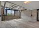Modern parking garage equipped with electric vehicle charging station and ample space at 1898 S Bannock St # 209, Denver, CO 80223