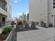 Beautiful condo patio featuring ample seating, potted plants, and a relaxing outdoor ambiance at 1898 S Bannock St # 209, Denver, CO 80223