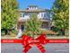 Charming two-story home featuring a well-manicured front yard and inviting entrance at 8537 E 35Th Ave, Denver, CO 80238