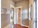 Hallway with built in storage leading to another room in the house at 8537 E 35Th Ave, Denver, CO 80238