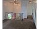 Inviting living room with a fan and natural light coming through the front door at 4678 S Lewiston Way, Aurora, CO 80015