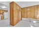 Mudroom offers plenty of storage space in the cabinetry, and a tiled floor leading to the kitchen at 505 Maple St, Golden, CO 80403