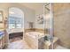 Bathtub and shower room adjacent to main bedroom at 3751 W 136Th Ave # P3, Broomfield, CO 80023