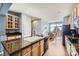 Well-equipped kitchen offering granite countertops, sleek appliances, and a seamless flow to the dining area at 3751 W 136Th Ave # P3, Broomfield, CO 80023