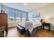 Comfortable main bedroom features hardwood floors, natural light, and neutral decor at 3751 W 136Th Ave # P3, Broomfield, CO 80023