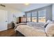 Bright main bedroom with three large windows overlooking the outdoors at 3751 W 136Th Ave # P3, Broomfield, CO 80023