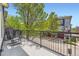 Private balcony overlooking a quiet street, perfect for relaxing outdoors at 9300 E Florida Ave # 1101, Denver, CO 80247