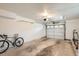 Spacious two car garage featuring stained concrete floors at 9300 E Florida Ave # 1101, Denver, CO 80247