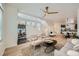 Cozy living room featuring hardwood floors, modern furnishings, and an open layout at 9300 E Florida Ave # 1101, Denver, CO 80247