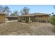 Spacious backyard featuring a sunroom with views of the surrounding landscape at 7950 Maria St, Westminster, CO 80030