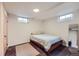 Cozy bedroom with natural light, hardwood floors, and a minimalist design at 7950 Maria St, Westminster, CO 80030